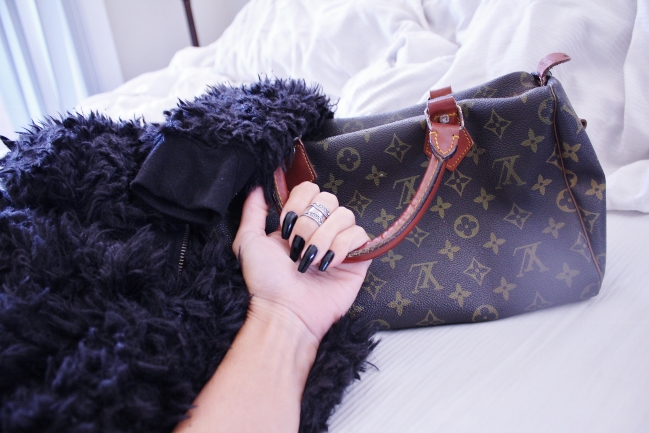 Louis Vuitton vintage handbag, part of LVMH Group | Conscious shopping