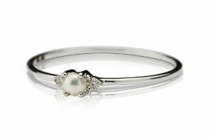THE 'LADY CAPULET' SEED PEARL AND DIAMOND 9CT WHITE GOLD RING