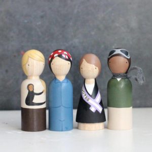The Trailblazers : The Trailblazers consists of four artisanally crafted dolls. Jane Goodall, a Suffragette, Rosie the Riveter and Bessie Coleman. These little wooden people are 3.5" in height, and are a good size for a 3 year old and up. 