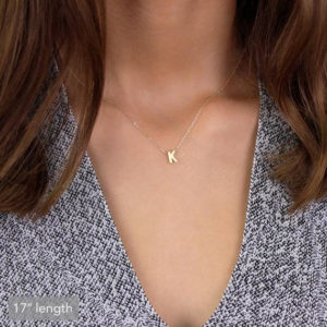 A gold necklace with your initial