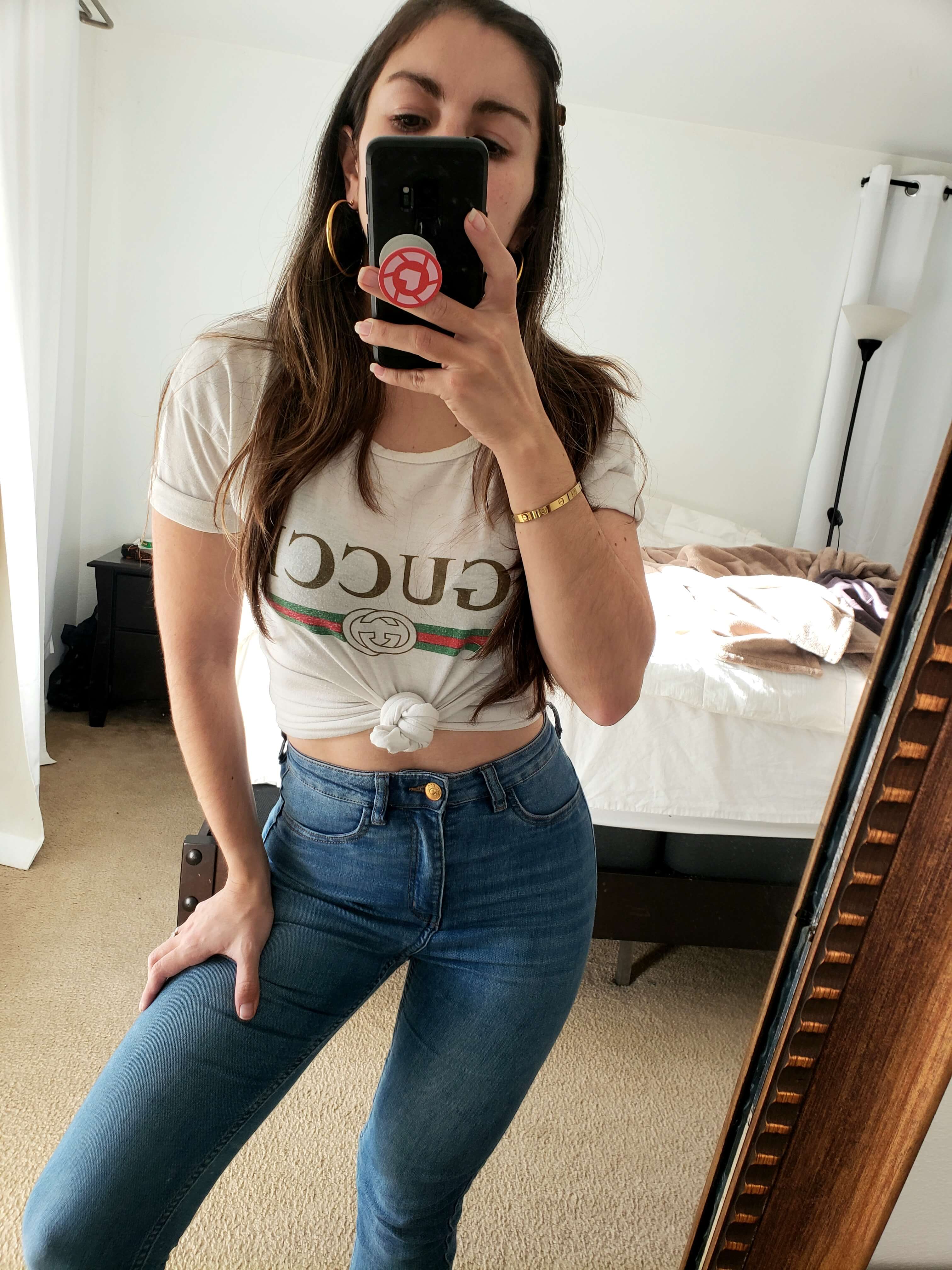 Gucci t-shirt and skinny jeans